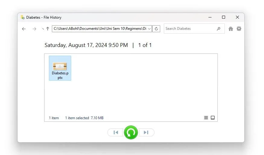 Giao diện File History trong Windows, hiển thị cách khôi phục một tệp PowerPoint về phiên bản trước đó để bảo vệ dữ liệu.