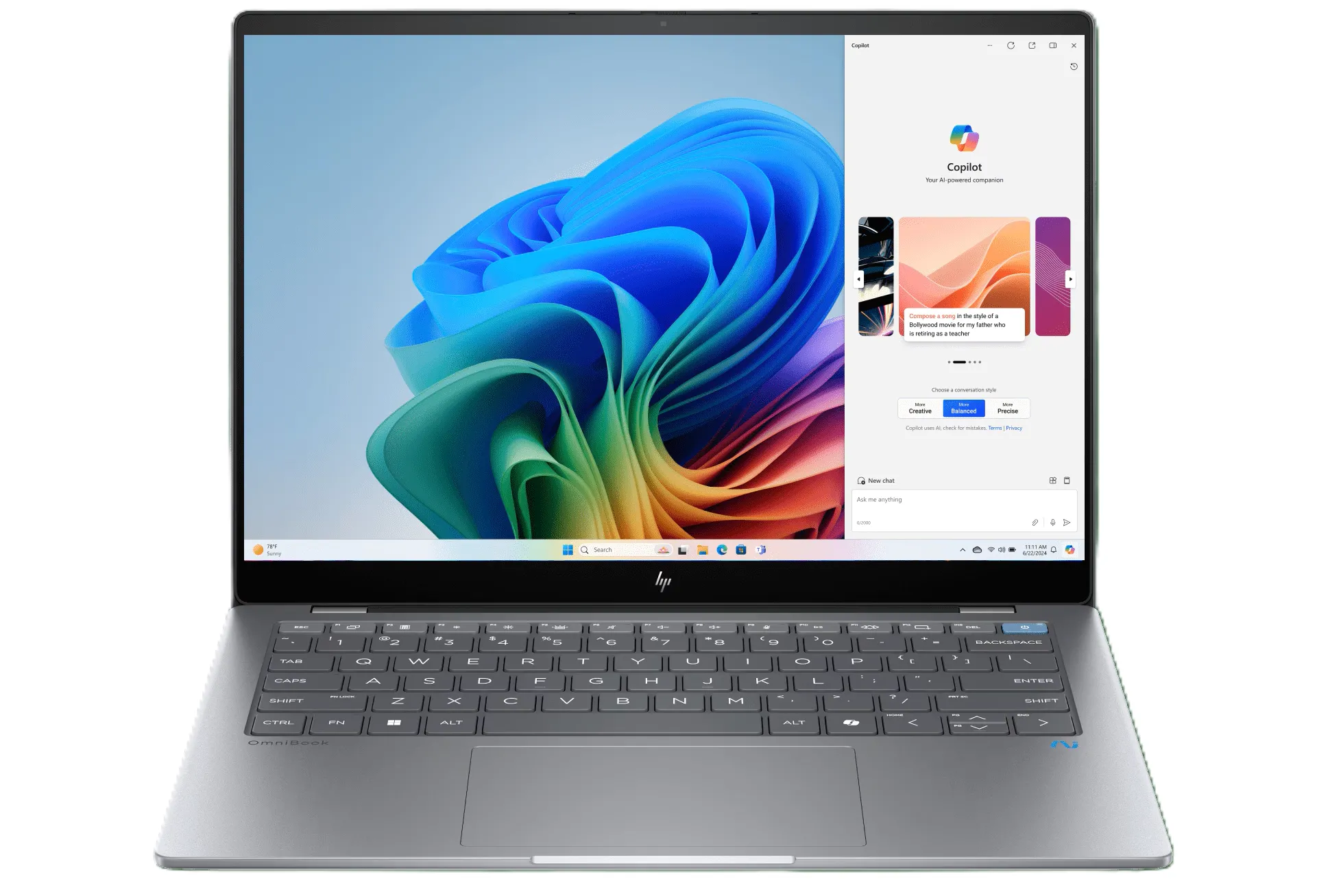 Laptop HP OmniBook X màu xanh đen với bàn phím lớn và thiết kế thanh lịch