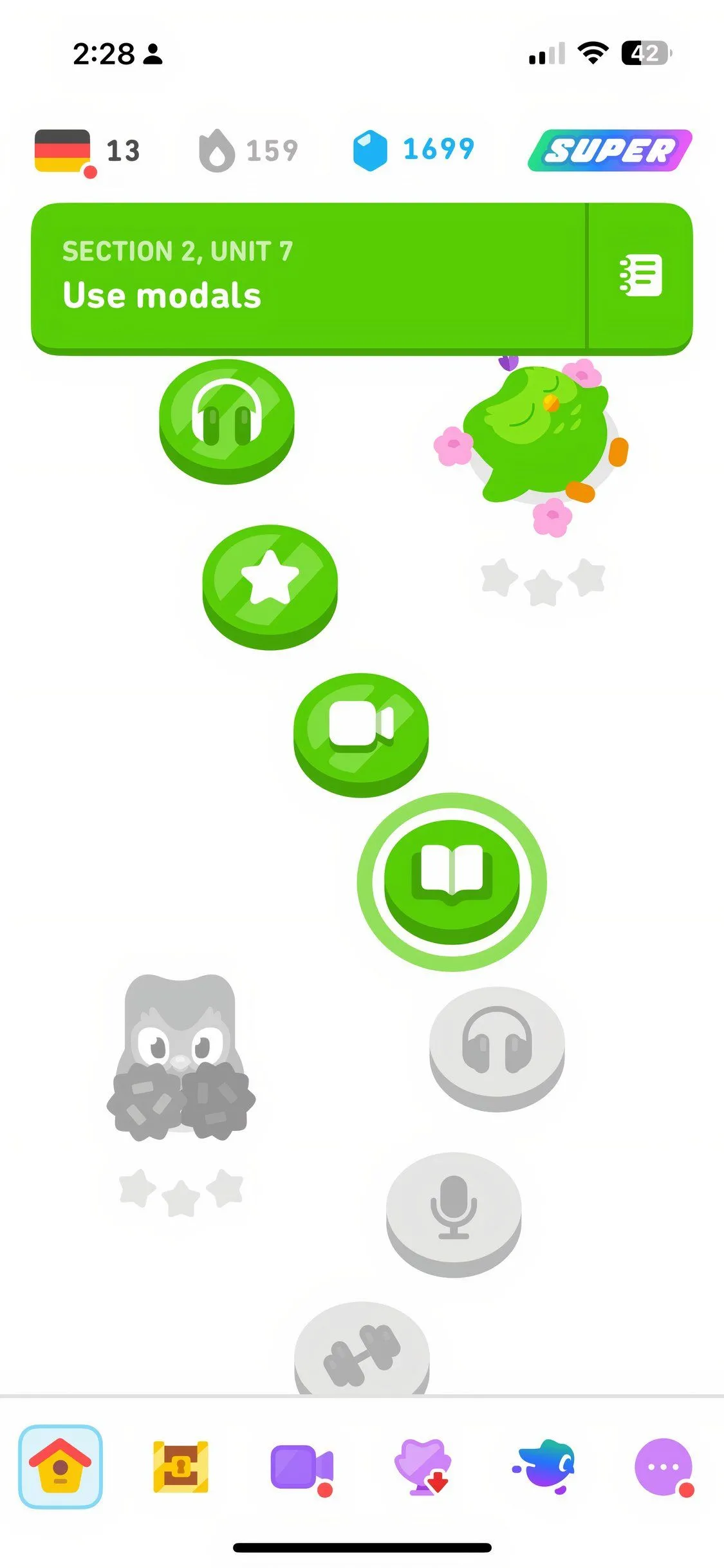 Màn hình trò chơi học ngôn ngữ Duolingo với các câu hỏi tương tác