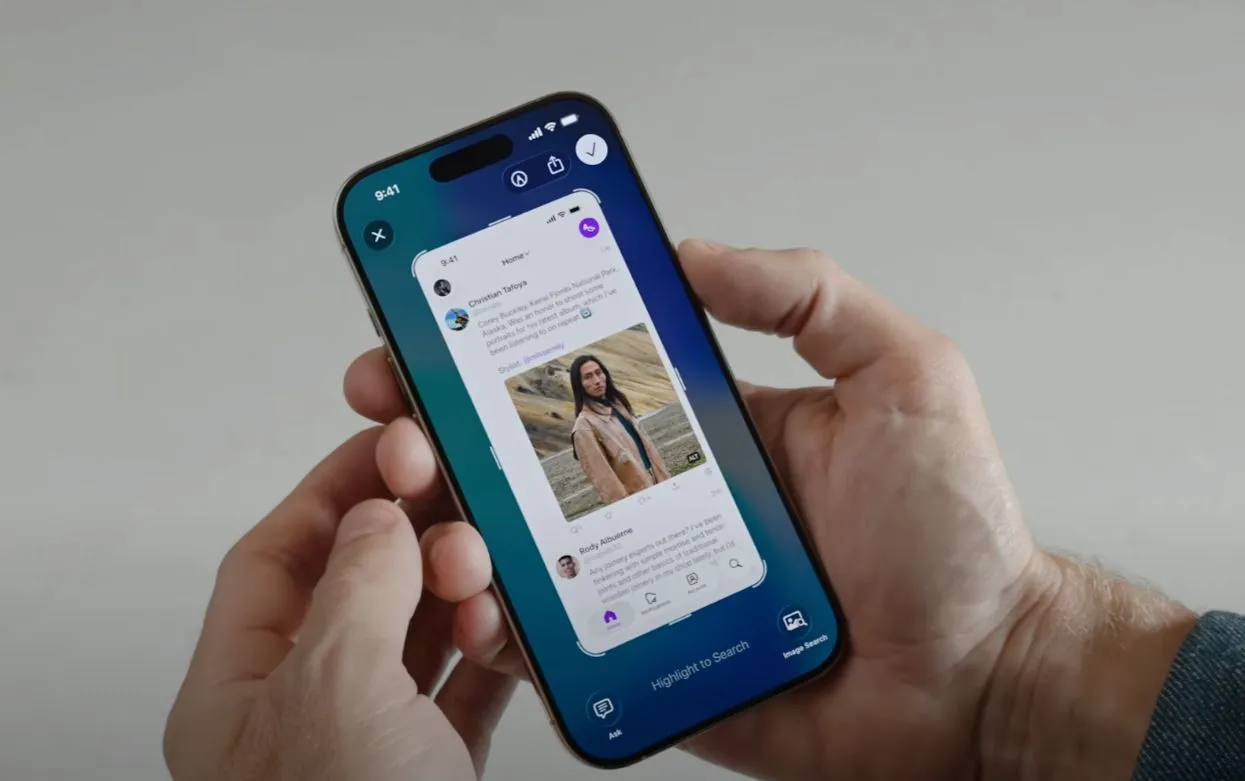 Minh họa người dùng đang sử dụng tính năng Trí tuệ Thị giác (Visual Intelligence) trên iPhone chạy iOS 26, thực hiện tìm kiếm thông tin từ một ảnh chụp màn hình chứa hình ảnh chiếc giày.